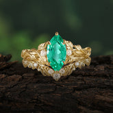 Nature-Inspired Marquise Emerald Engagement Ring Set with Vine Motif